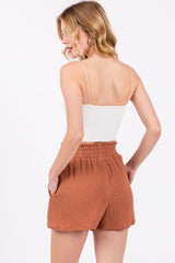 Rust Textured Smocked Waist Shorts