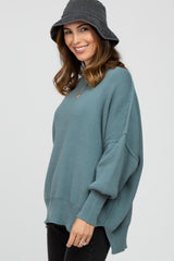 Light Teal Mock Neck Exposed Seam Sweater