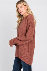 Rust Textured Knit Exposed Seam Sweater