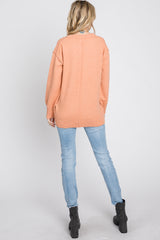 Peach Exposed Seam Sweater