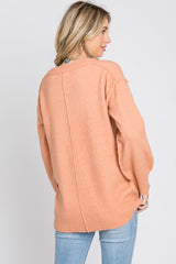 Peach Exposed Seam Sweater