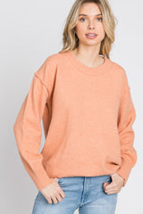 Peach Exposed Seam Sweater