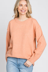 Peach Exposed Seam Sweater