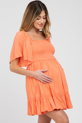 Coral Smocked Tie Back Maternity Dress