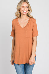 Camel Pocket Front Curved Hem Top