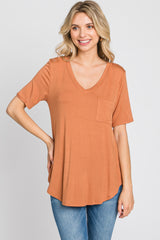 Camel Pocket Front Curved Hem Top