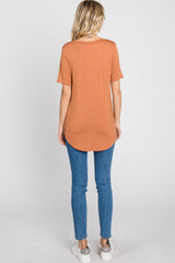 Camel Pocket Front Curved Hem Top