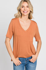 Camel Pocket Front Curved Hem Top