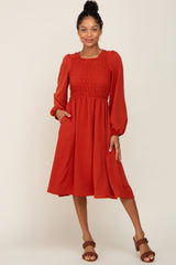 Rust Smocked Long Sleeve Midi Dress