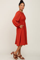 Rust Smocked Long Sleeve Midi Dress