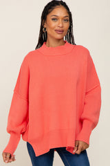 Coral Mock Neck Exposed Seam Sweater