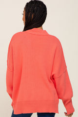 Coral Mock Neck Exposed Seam Sweater