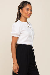 Ivory Ruffle Accent Tie Front Blouse