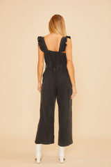 Black Denim Jumpsuit With Ruffle Shoulder Strap